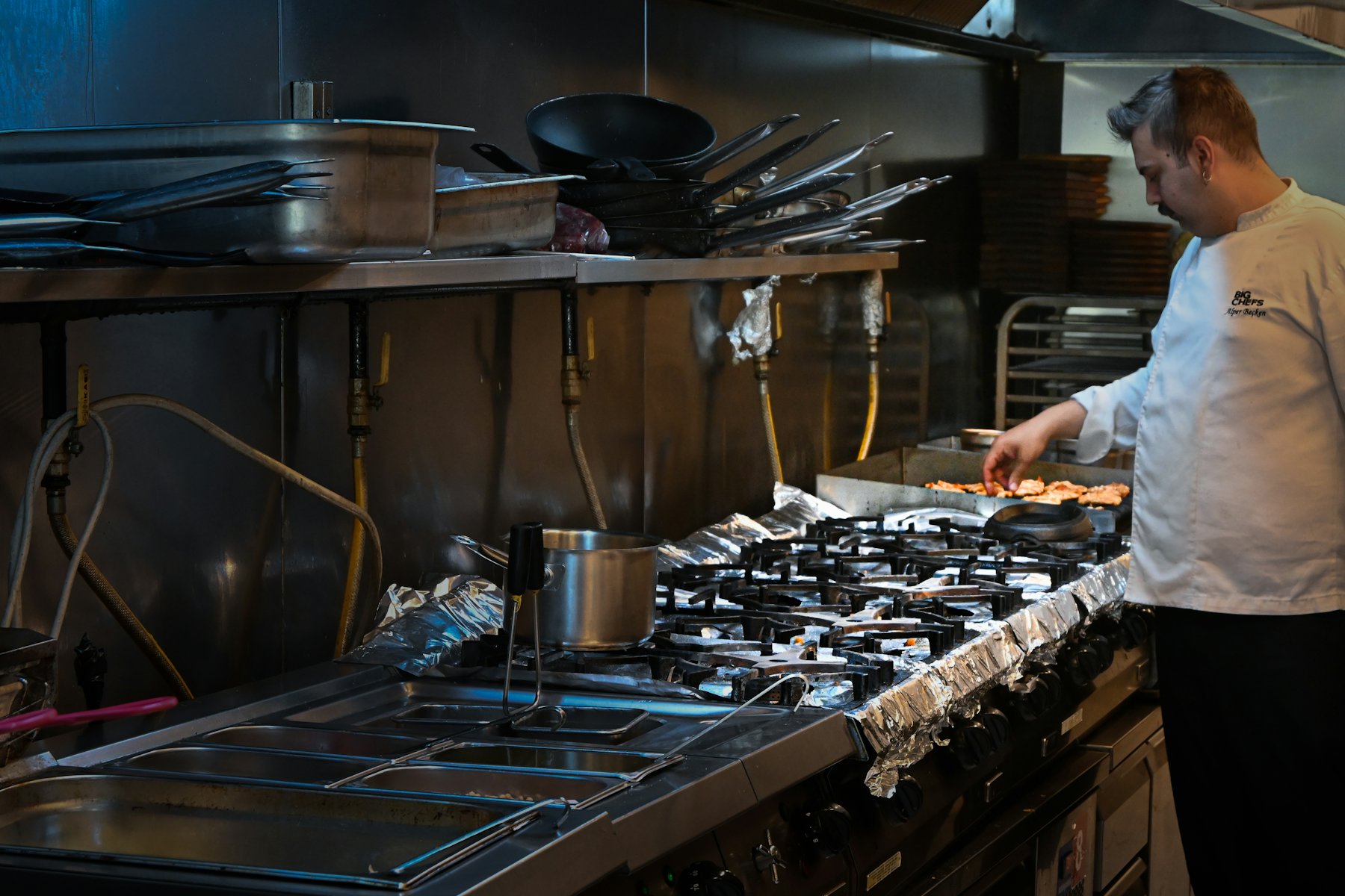 A busy commercial kitchen at service